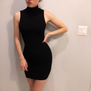 Nikibiki | Black turtleneck mini dress with cutout